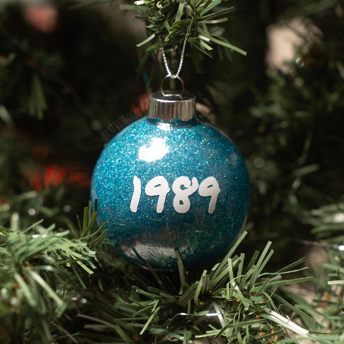 Taylor Christmas Ornament | Glitter | Plastic | Eras: Showgirl / Round 2.36”