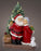 Santa and Mrs. Claus by the Christmas Tree