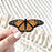 Clear Monarch Butterfly Sticker, 3x1.5 in.