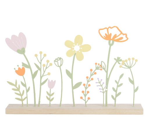 Scenery of Metal Flowers on Wood Base