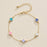 Gold Clover Charm Bracelet with Enamel Accents