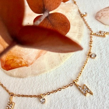 "Ride the Lighting" Charm Necklace in Gold