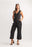 Black Sleeveless Button Front Jumpsuit With Pkt