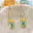 Yellow Flower Gold Teardrop Dried Flower Earrings