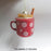 Orn Red Mug w/Snowflakes filled with Cocoa